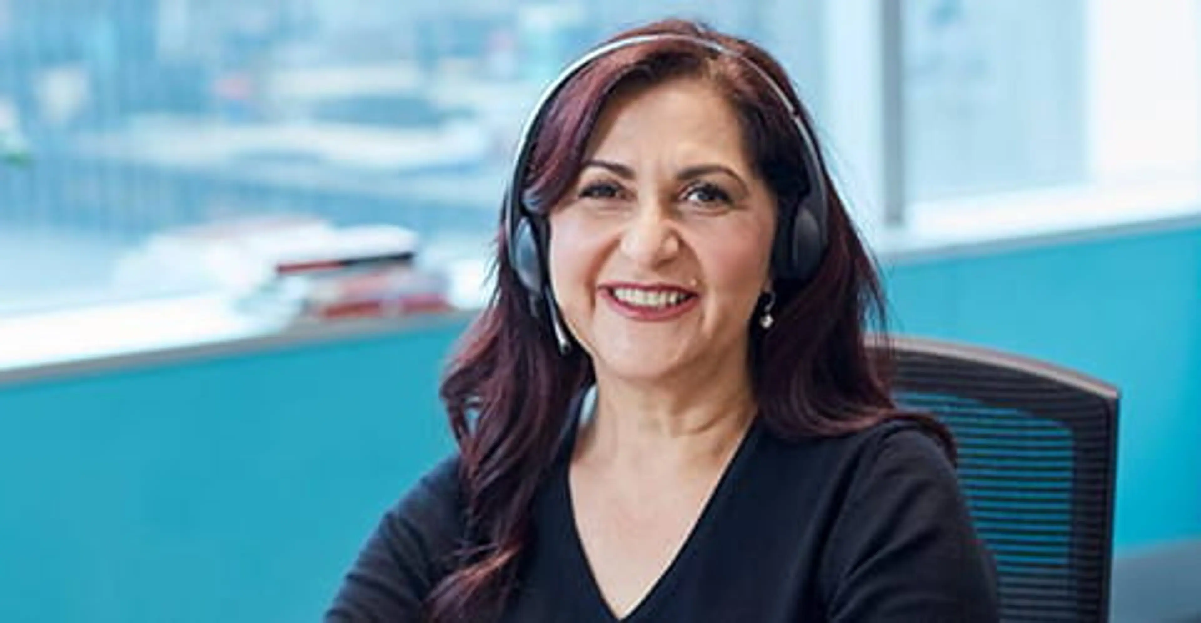 An advisor on a phone consultation with a student